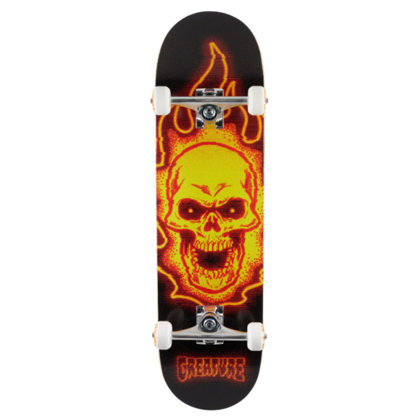 Skateboard with a skull and flames design on a black background