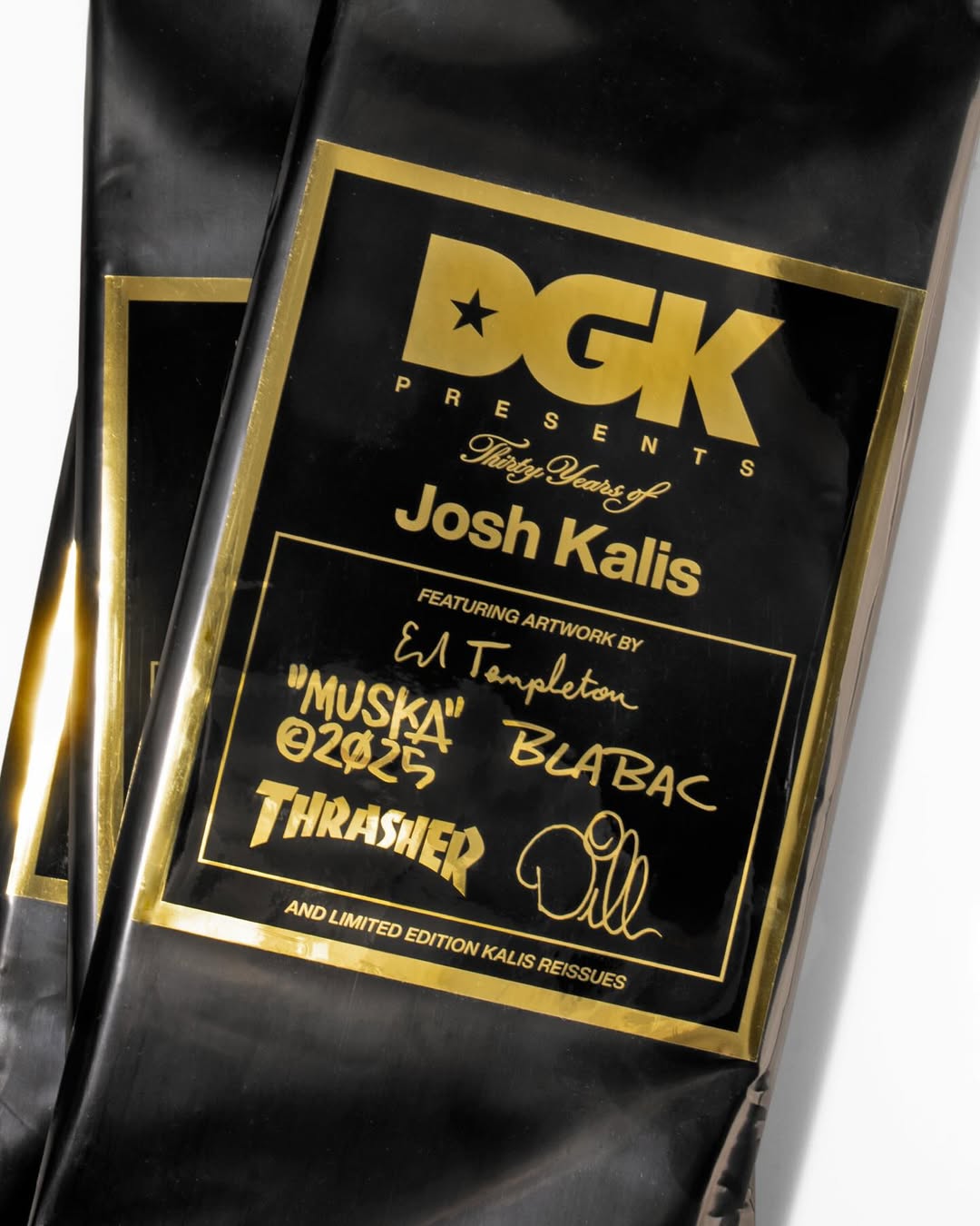 Black DGK coffee bag with gold text and branding