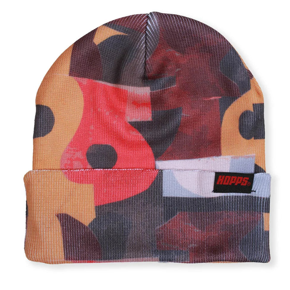 Colorful beanie with geometric pattern on a white background