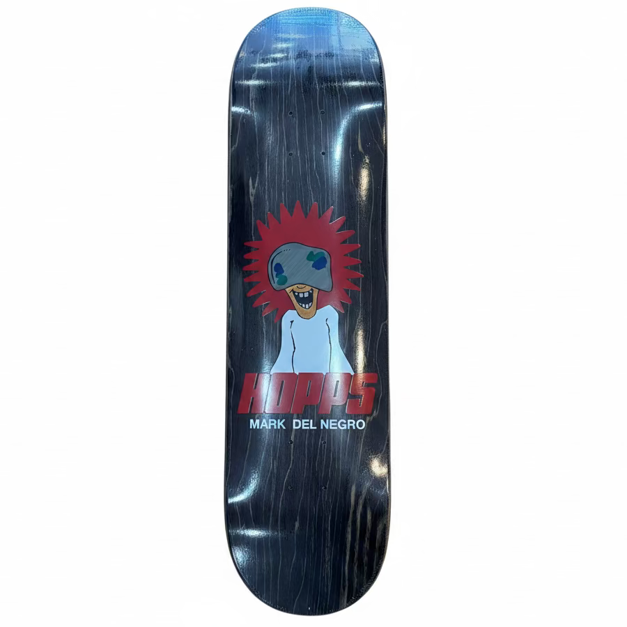 Skateboard deck with a graphic design and text on a white background