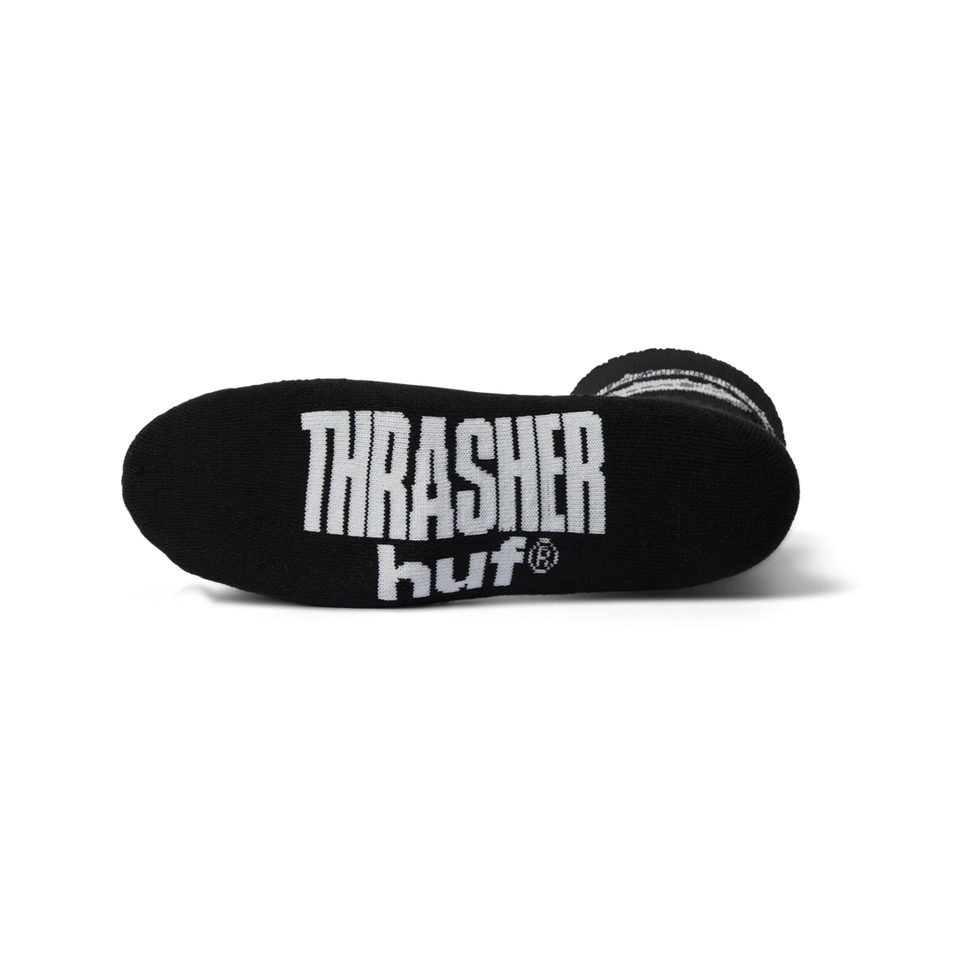 Black sock with 'Thrasher' and 'huf' logos on a white background