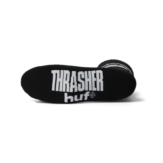 Black sock with 'Thrasher' and 'huf' logos on a white background