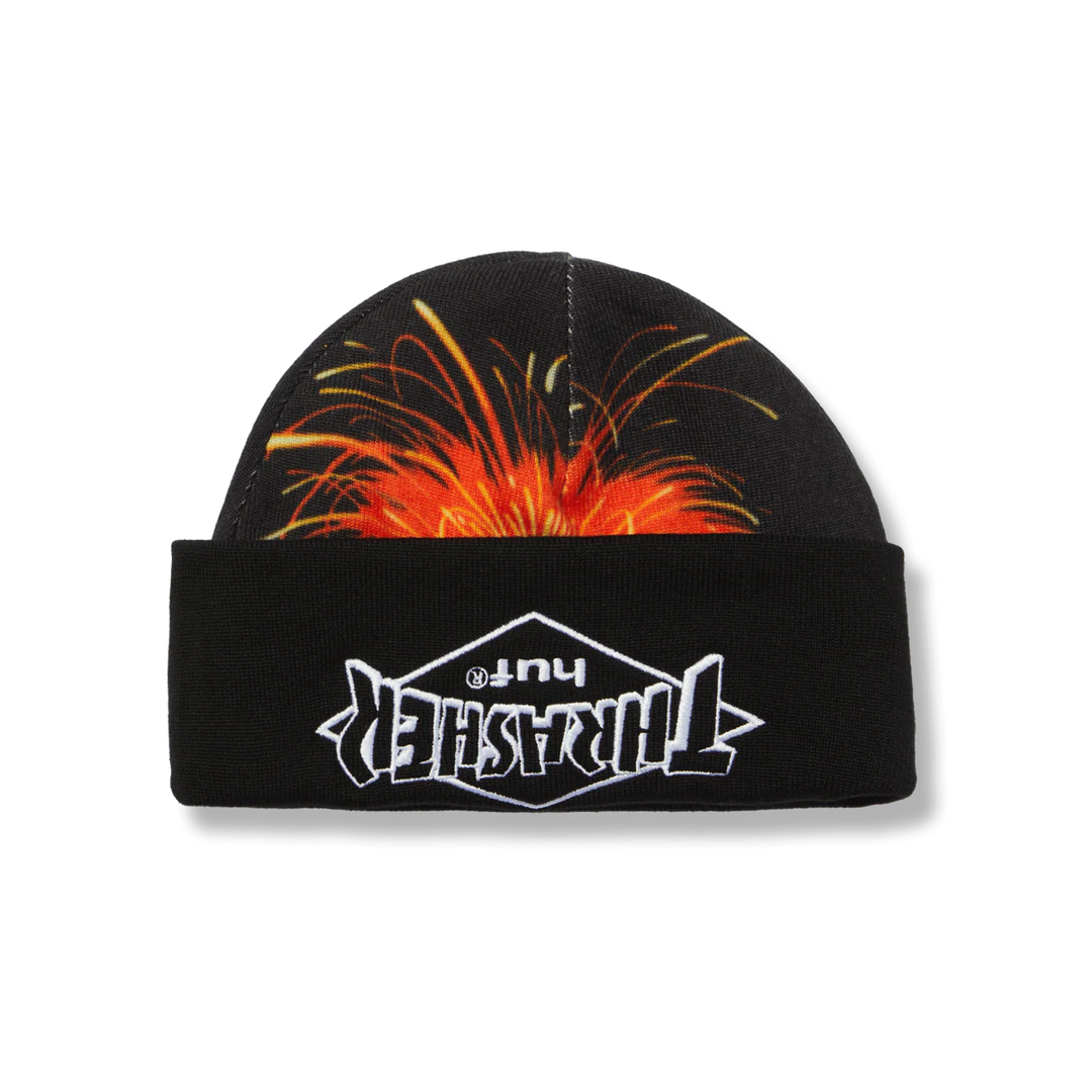 Black beanie with fiery design on top and visible branding on a white background