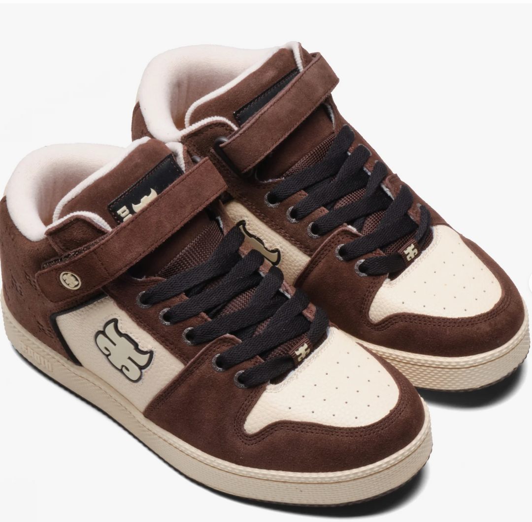 Brown and white sneakers with black laces on a white background