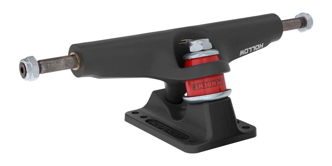 A black skateboard truck with a black baseplate, featuring a red and silver Kenda suspension bushing and white branding text, shown on a solid white background.