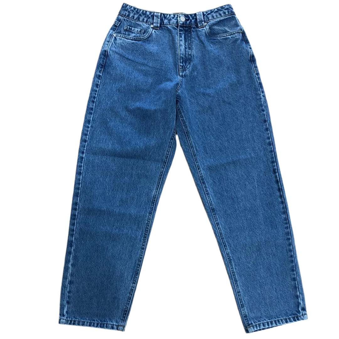 A pair of blue baggy denim pants with embroidery details, front view.
