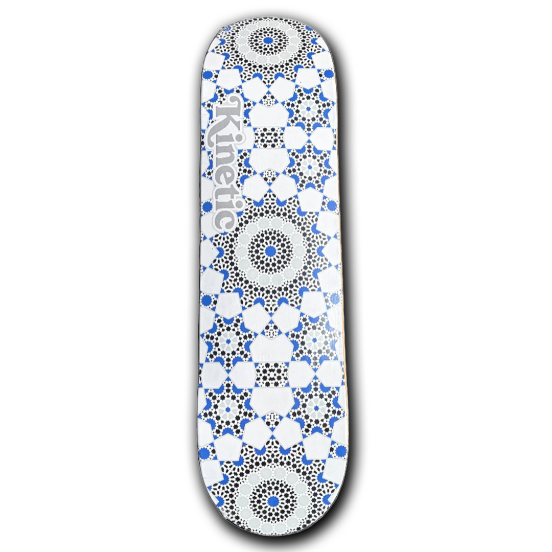 Skateboard deck with a geometric pattern and 'kinetic' branding on a white background