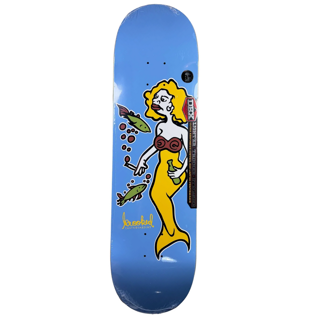 A skateboard deck with a blue gradient background featuring a retro-style illustration of a mermaid with yellow hair, a red bikini top, and green fish, shown on a plain white background.