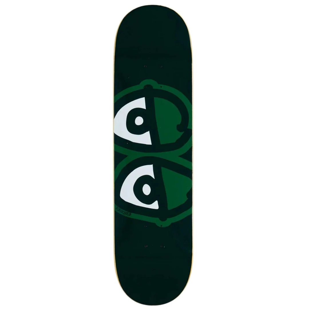 green krooked kateboard deck with eyes logo