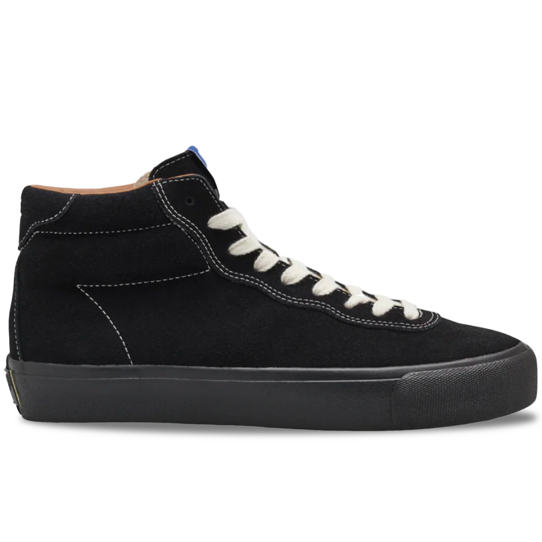 Black high-top sneaker with white laces on a white background