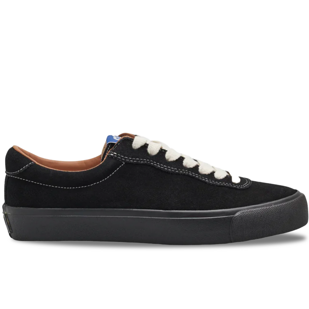 Black sneaker with white laces on a white background