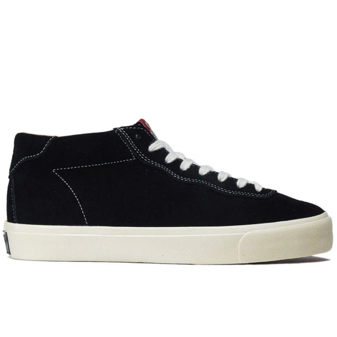 Black high-top sneaker with white laces 