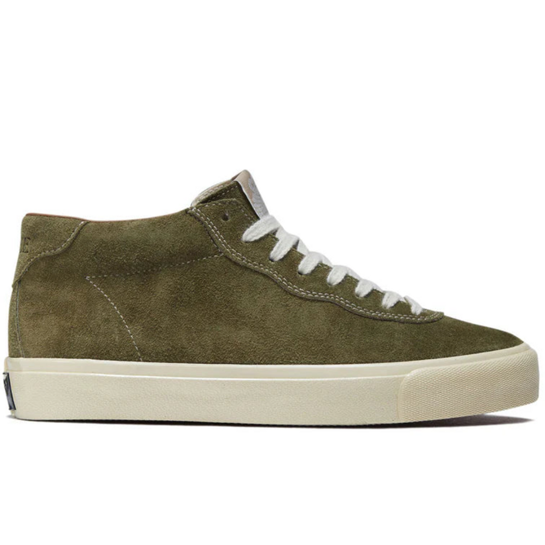 Last Resort Green high-top sneaker with white laces on a white background
