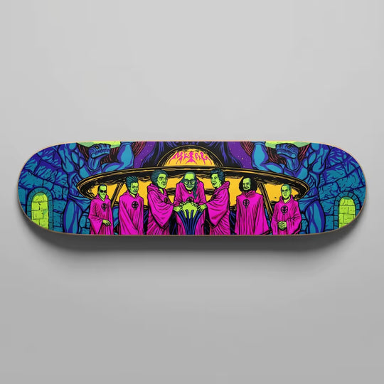 Skateboard deck with alien and pink creature design on a gray background