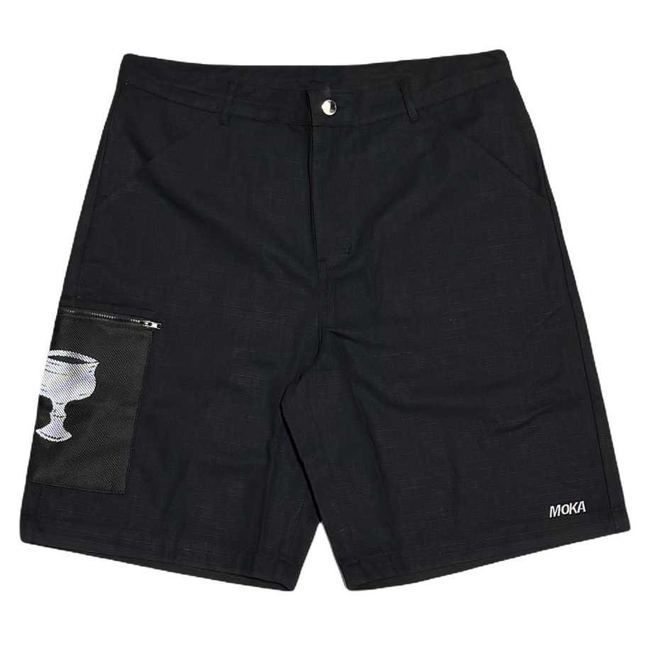 Black cargo shorts with a zippered pocket on the left leg featuring a white goblet graphic, and a small white 'MOKA' brand logo on the right leg, shown flat on a white background.