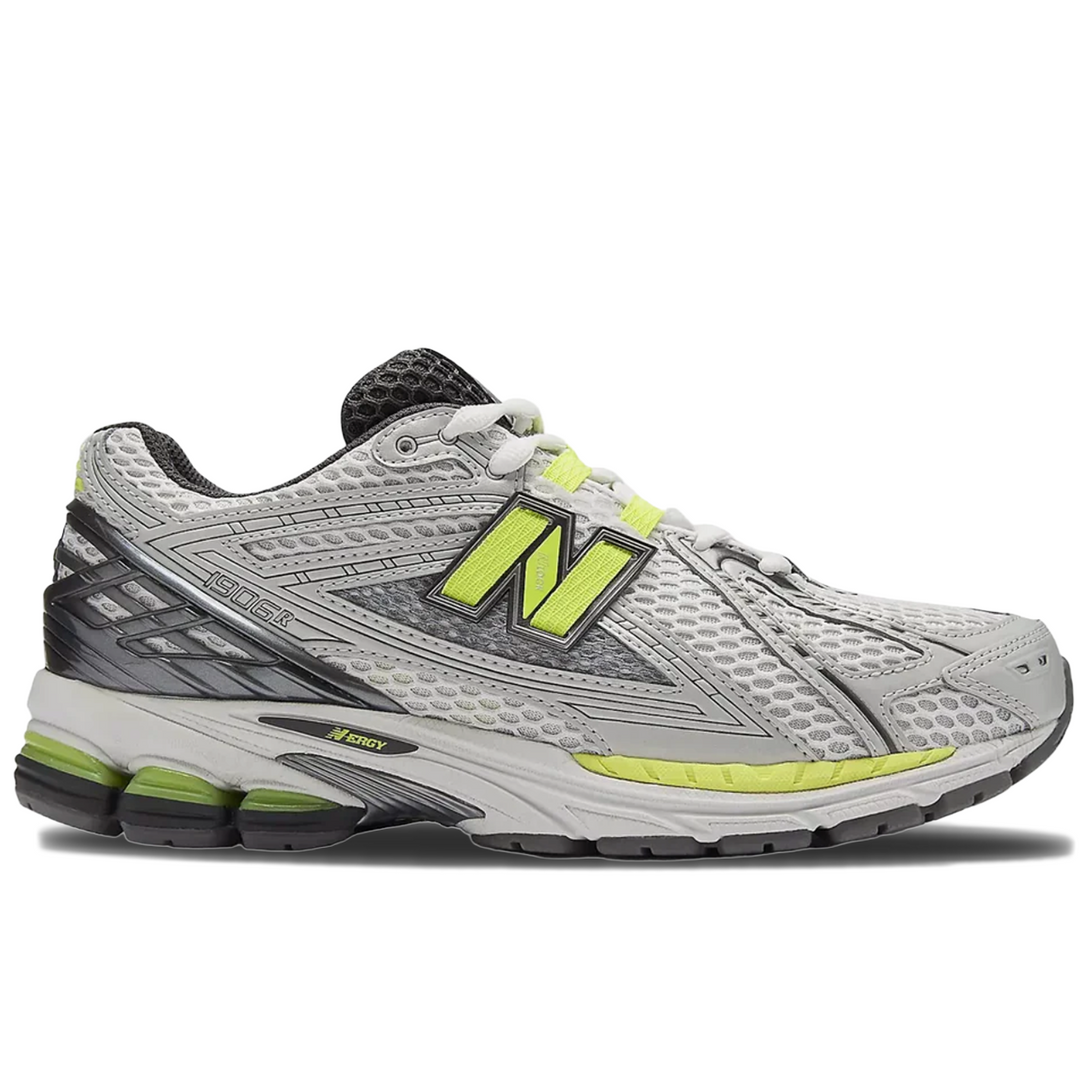 Gray and volt new balance running shoe with green accents