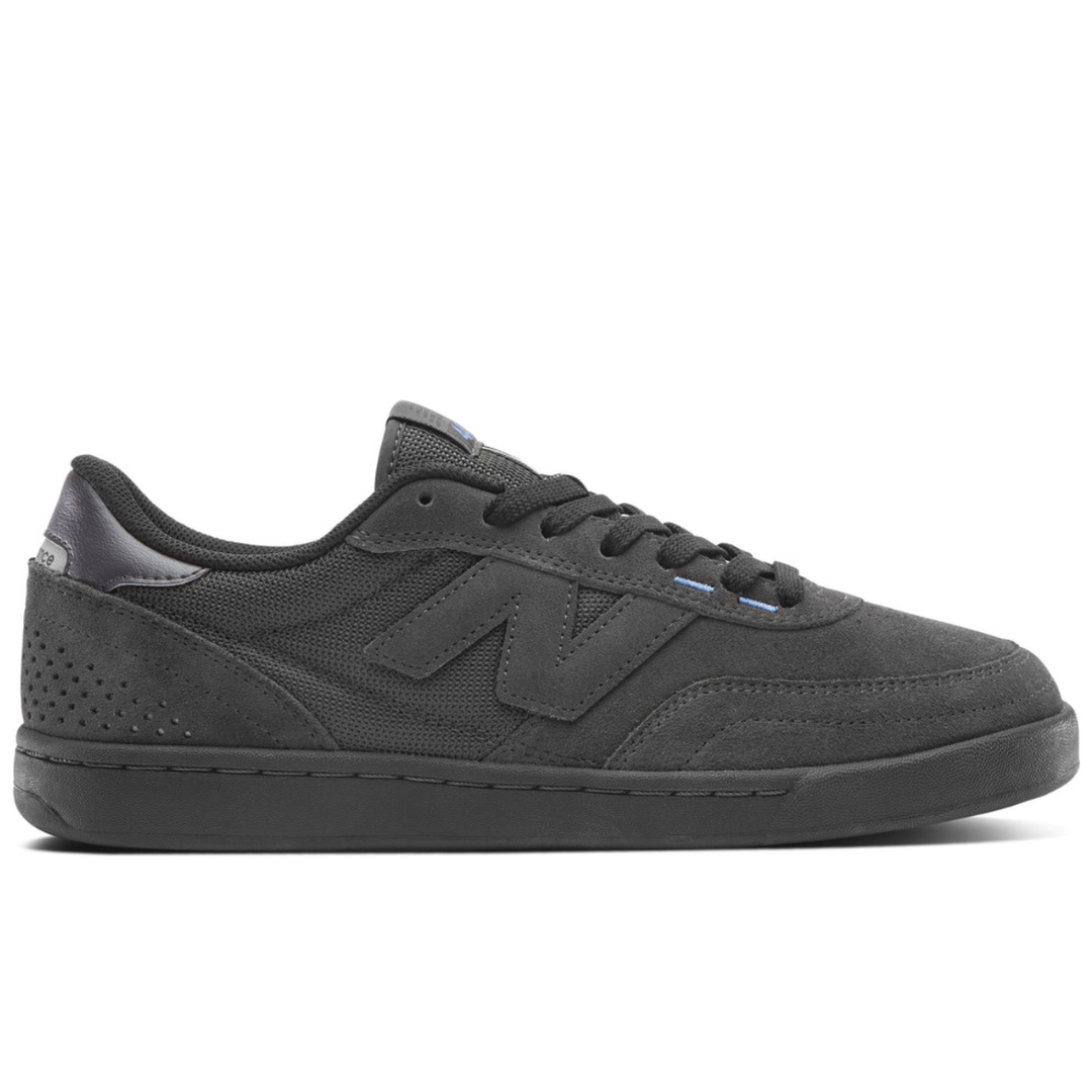 Black sneaker with New Balance logo on a white background