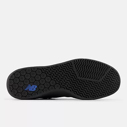Black sneaker sole with New Balance logo on a white background