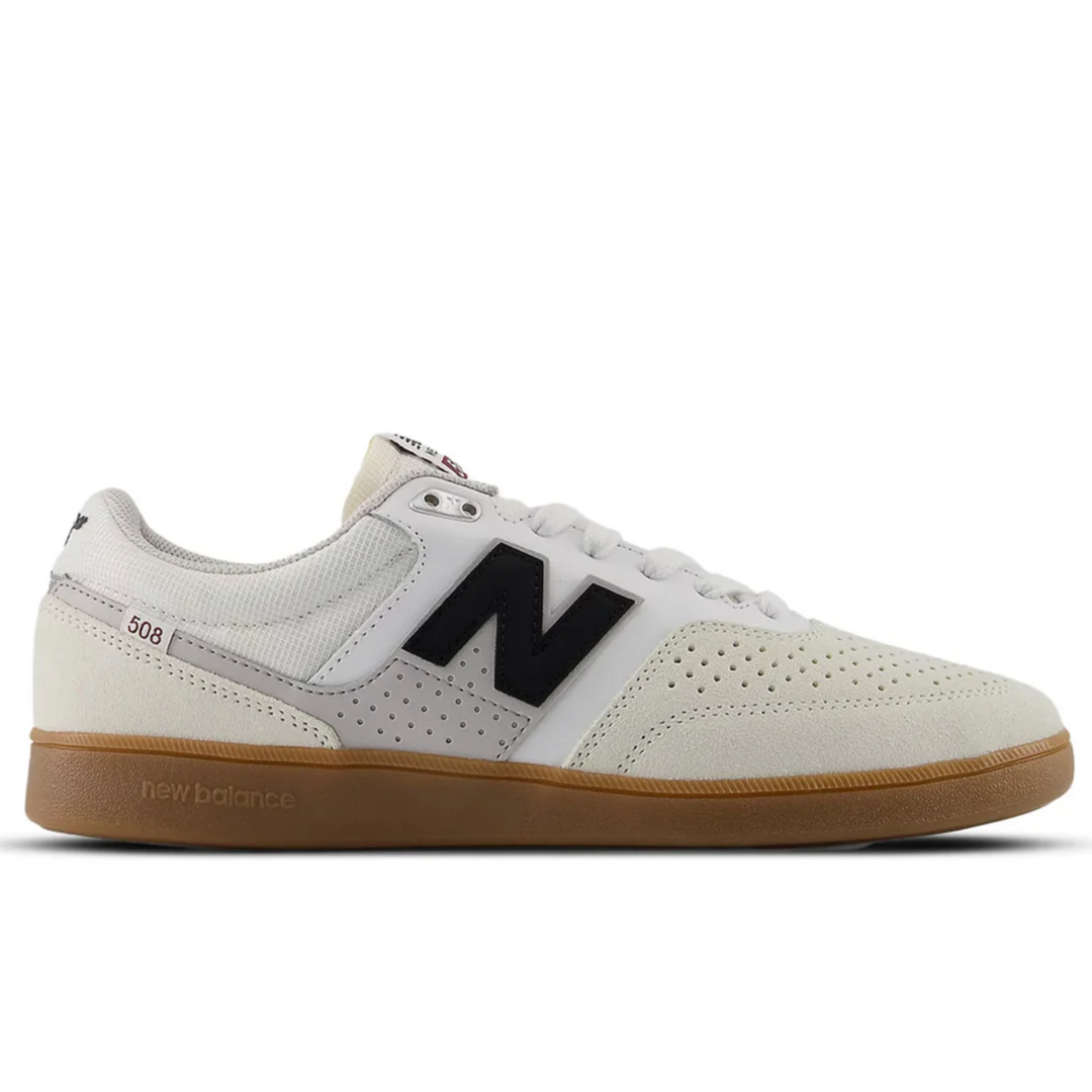 White sneaker with black logo on a white background