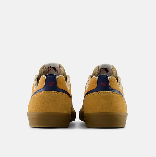 Visible rubber layer under suede for added durability