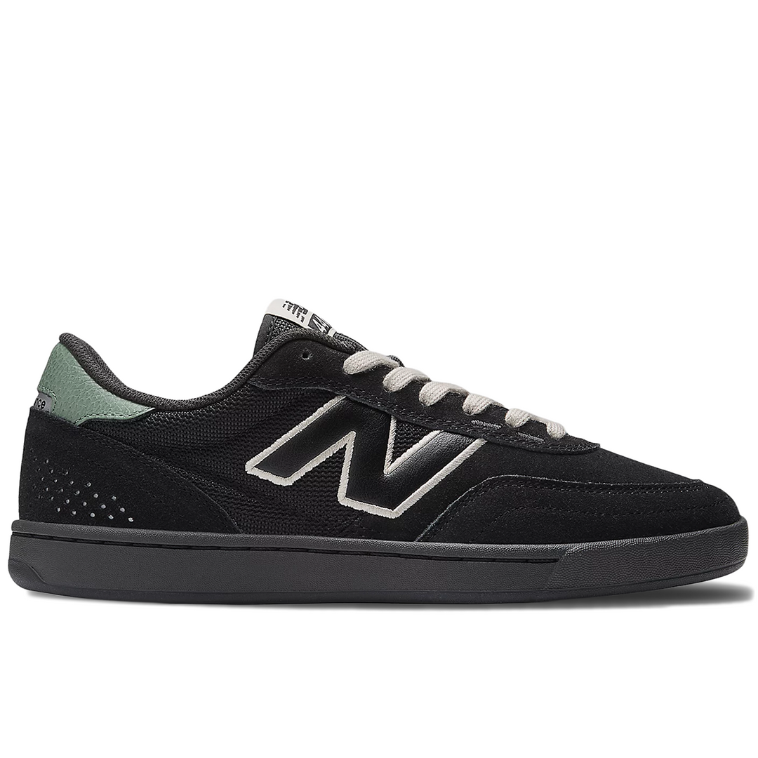 Black sneaker with a new balance brand logo 