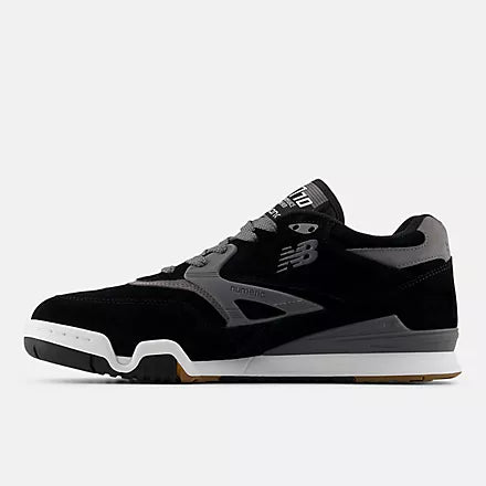 Black and gray athletic shoe on a light gray background