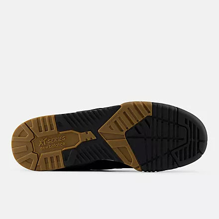Close-up of a black and brown sole with 'X-Series' branding on a white background
