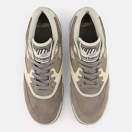 Pair of gray New Balance sneakers on a white background