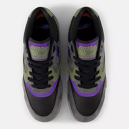 Pair of black and gray sneakers with purple accents on a white background