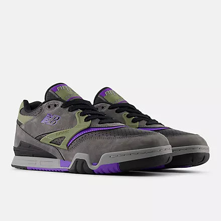 Gray and purple sneakers on a white background