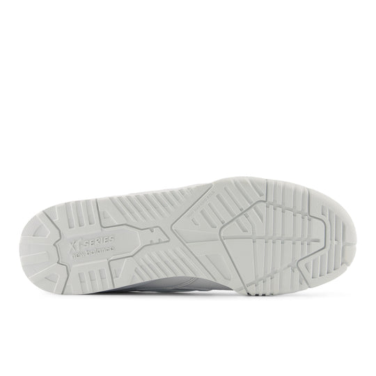 Gray shoe sole with brand logo on a white background