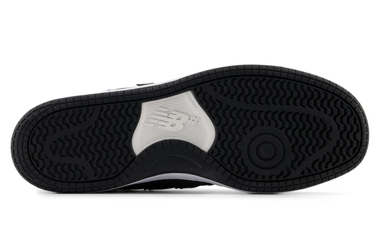 Black and white sneaker sole with brand logo on a white background