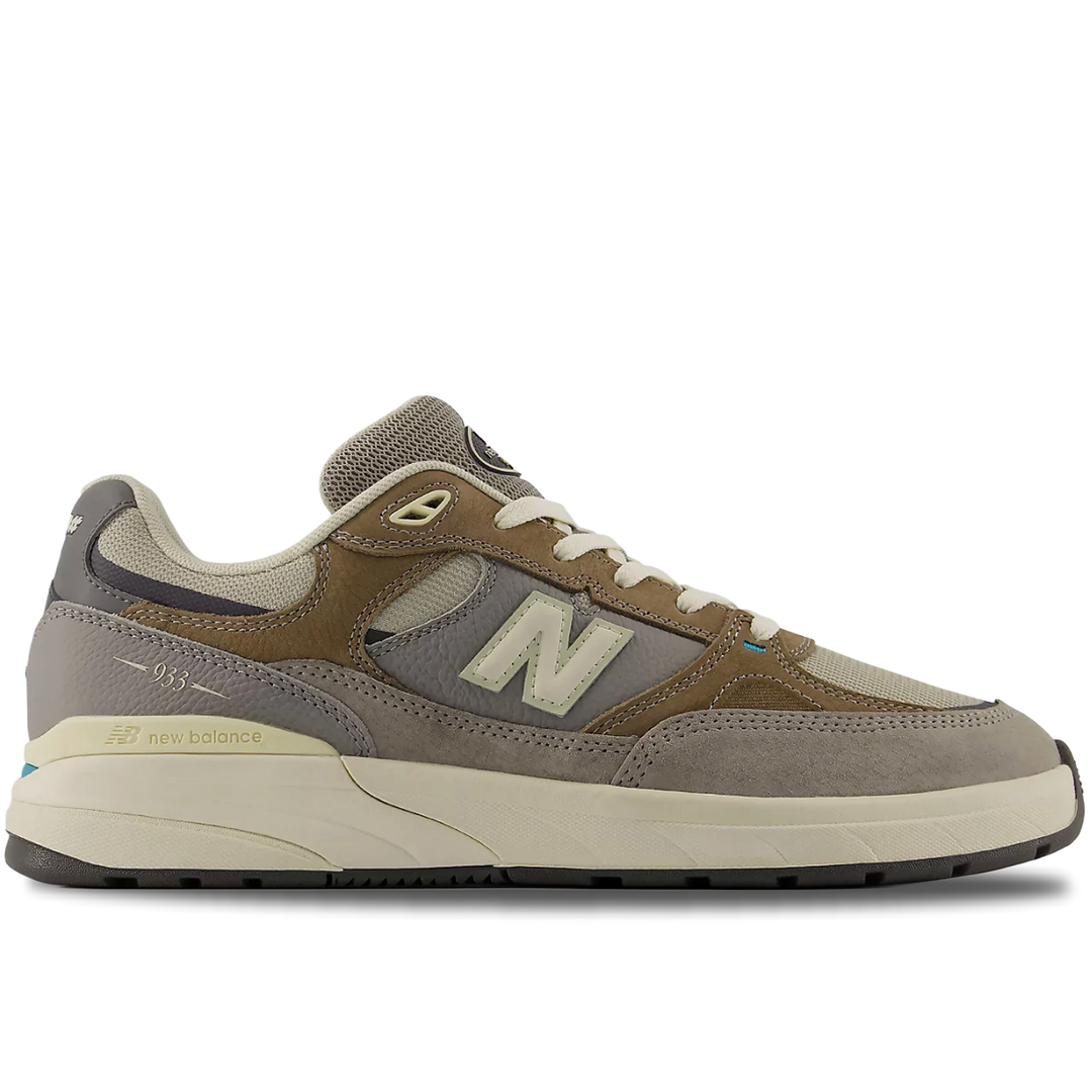 Brown and gray sneaker with New Balance logo on a white background