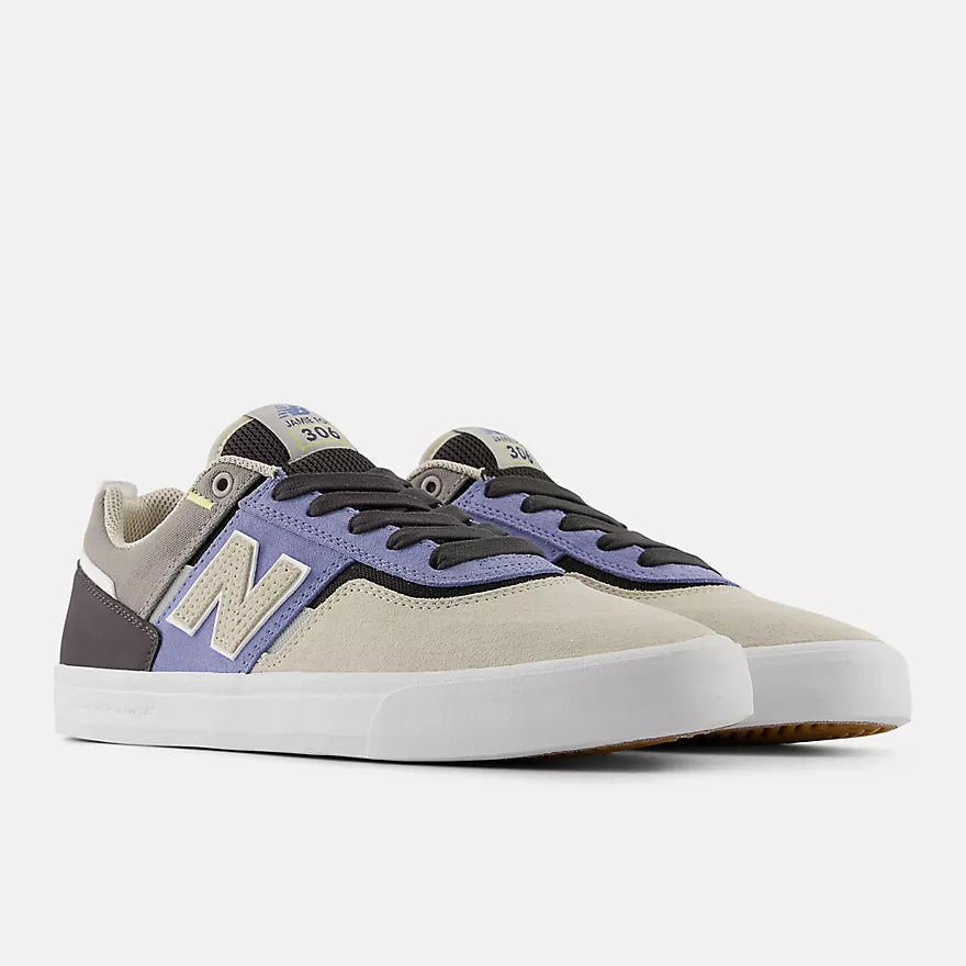Pair of sneakers with a purple and gray design on a white background