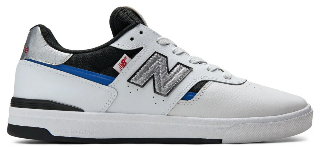 White sneaker with black and blue accents on a white background