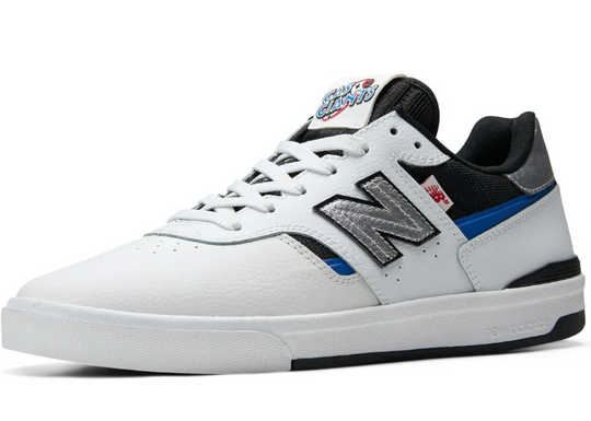 White sneaker with black and blue accents on a white background