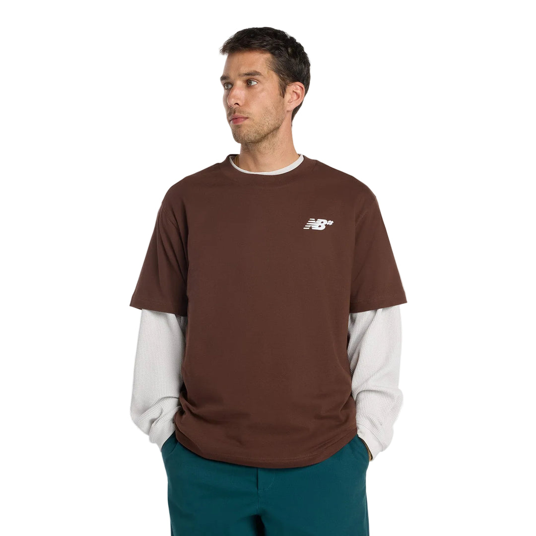 new balance left chest logo on a brown tee