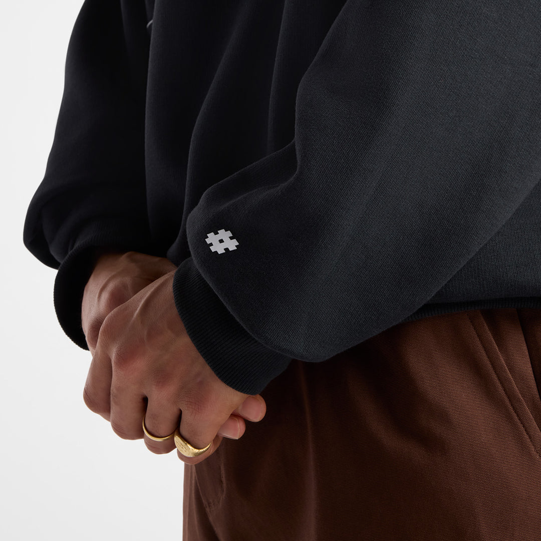 close up of numeric logo on sleeve