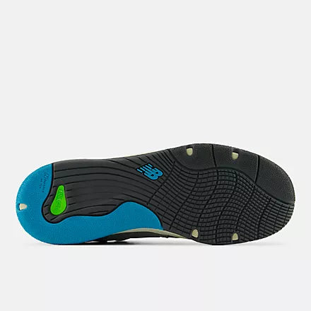 Close-up of a black and blue athletic shoe sole on a white background