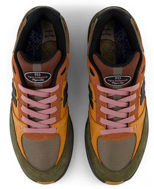 pink laces on multi colored shoe