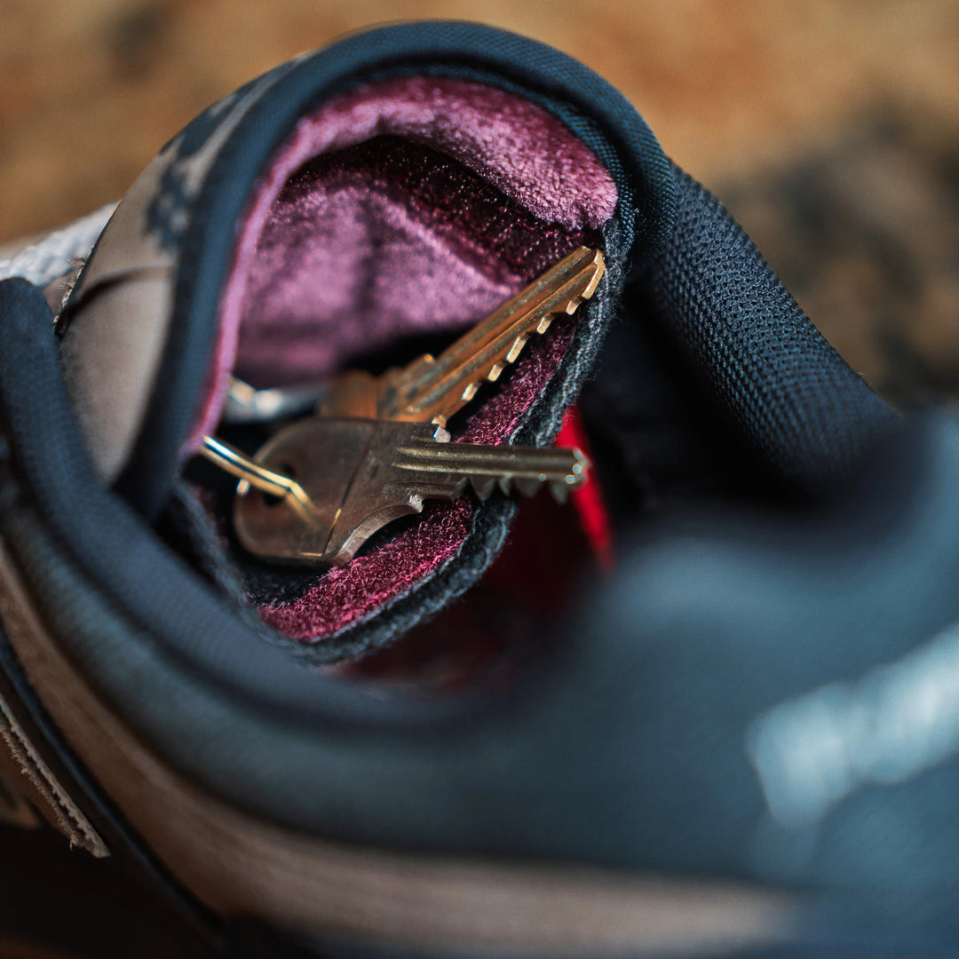 Close-up of a key inside a shoe with a blurred background
