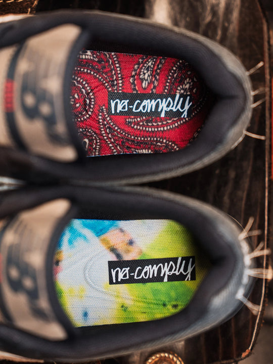 Black shoes with colorful soles and &
