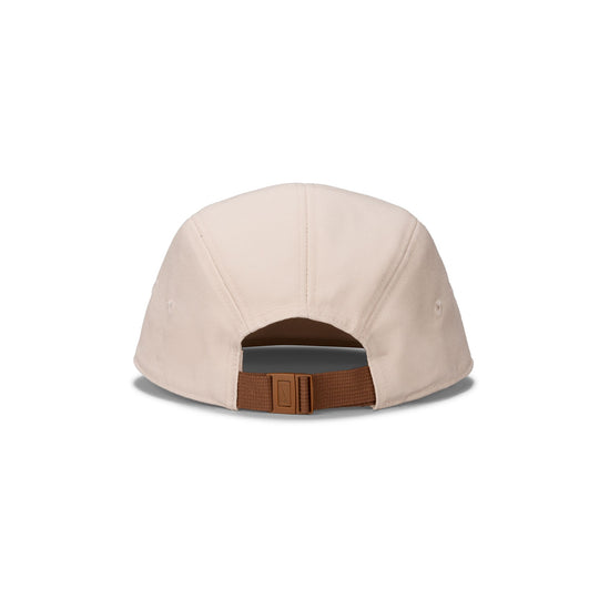 The back view of a beige 5-panel baseball cap with an adjustable brown strap and a gray fabric lining visible at the back.