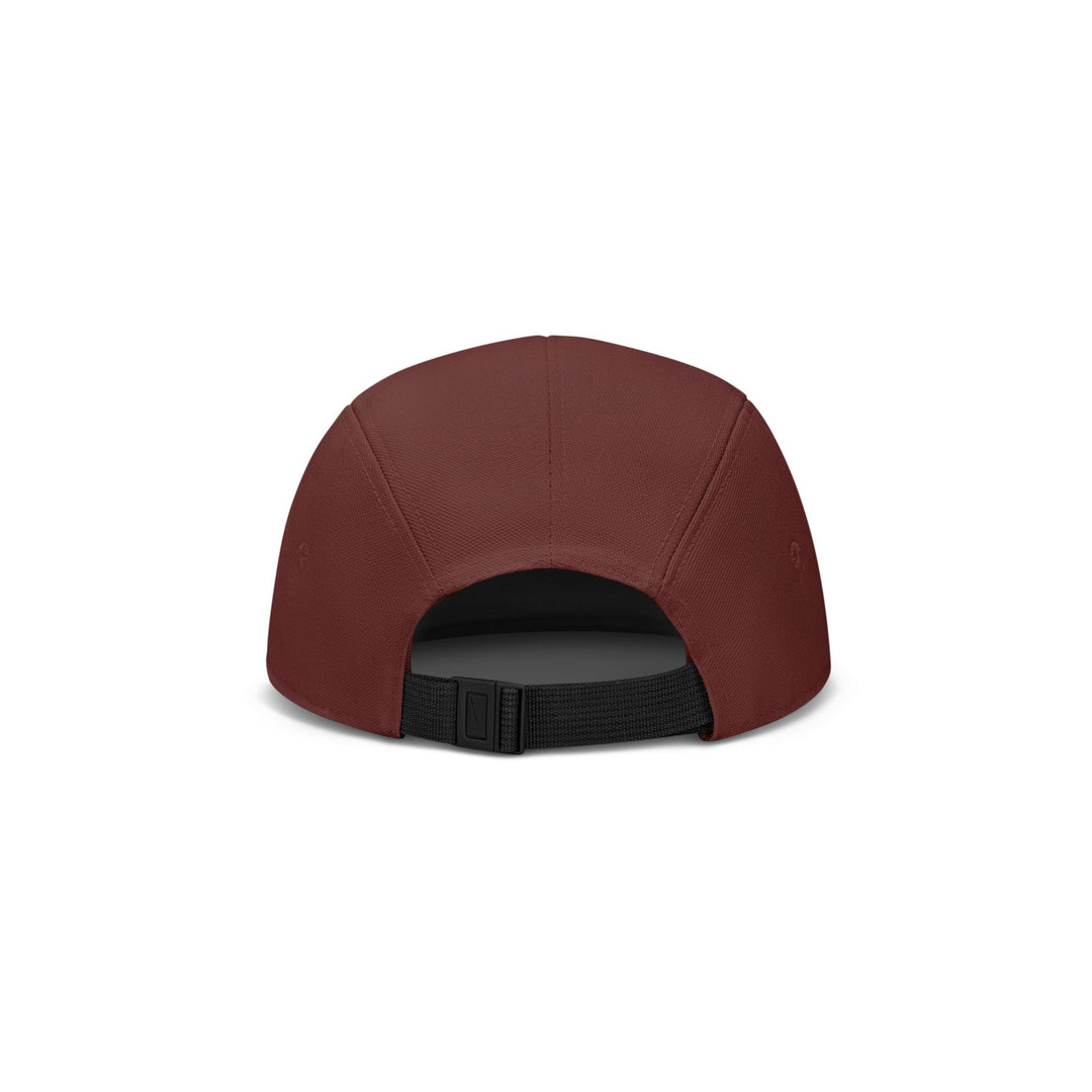 A rear view of a structured baseball cap in a deep burgundy red, featuring a black adjustable strap closure, set against a plain white background.