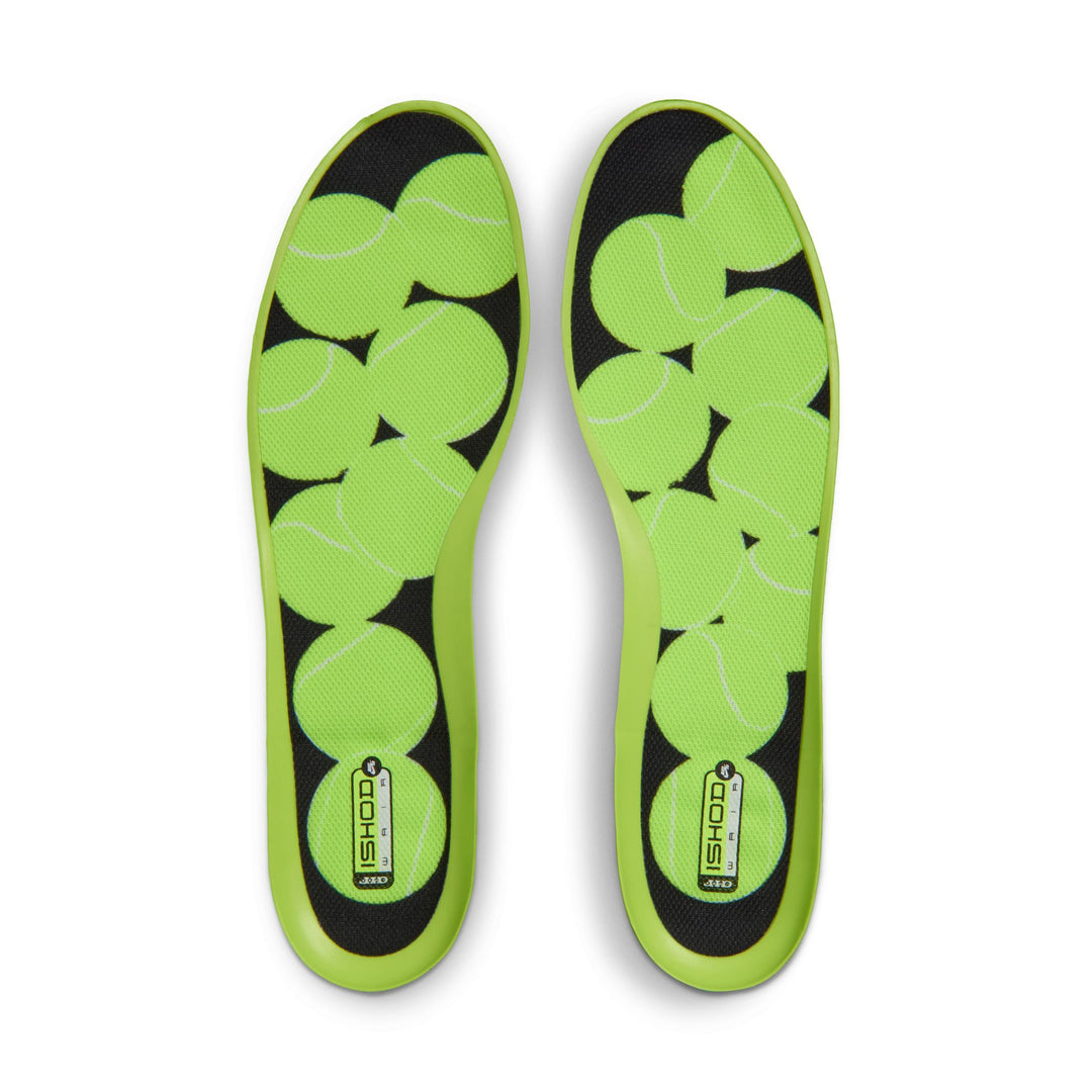 Green and black insole with a pattern on a white background