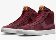 Burgundy upper in mesh, suede, and leather