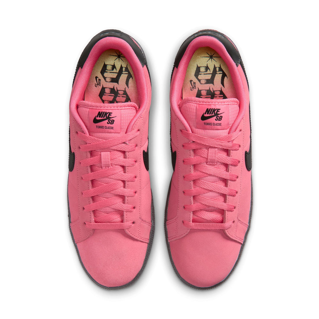 Pink Nike SB shoes with black accents on a white background
