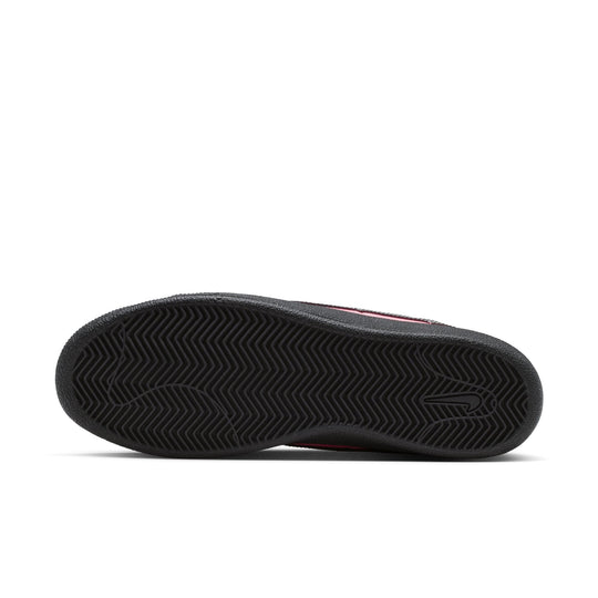 Black cleated shoe sole on a white background
