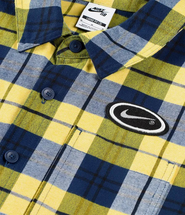 Plaid shirt with Nike logo and branding on a close-up view