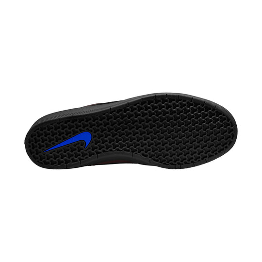 Black shoe sole with tread pattern on a white background